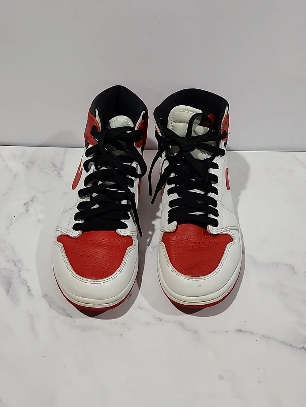 Nike  Air Jordan 1 Red and White High-Top Sneakers